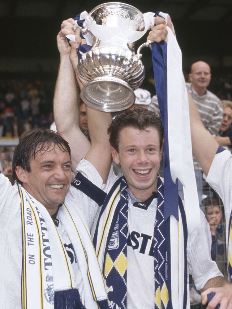 David holds the FA Cup aloft with skipper Mabbsy...